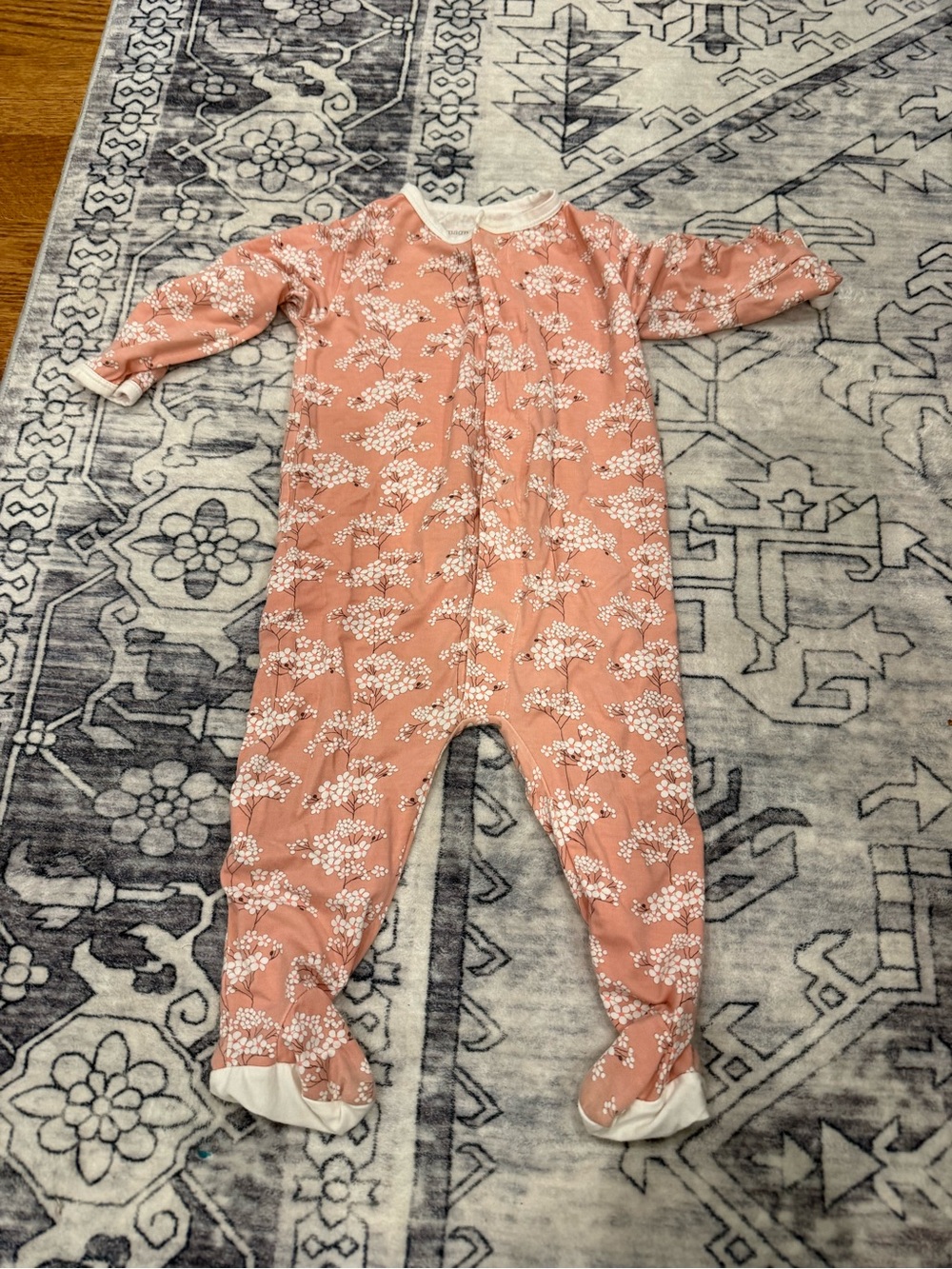 Magnetic Me modal footie in the cherry blossom pattern 6-9 months